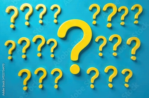 many yellow question marks on a blue background  photo