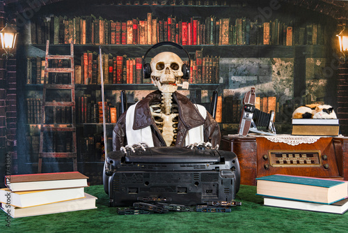 skeleton smoking pipe listening to old cassette tapes on headphones  calico cat on antique radio and vintage camera with old library background