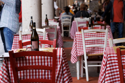 Empty Tables and Chairs Outside of Restaurant, Mantua photo