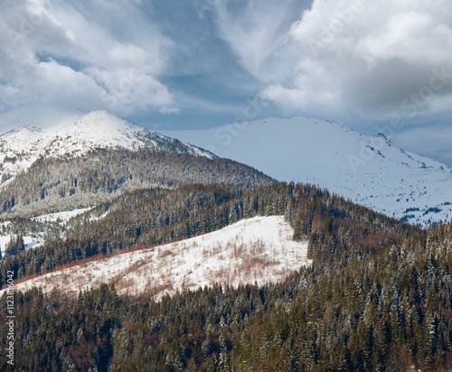 Sunrise morning winter snow covered scenery picturesque alp mountain ridge (Ukraine, Carpathian Mountains, Chornohora Range, tranquility peaceful view from Dzembronya village). photo