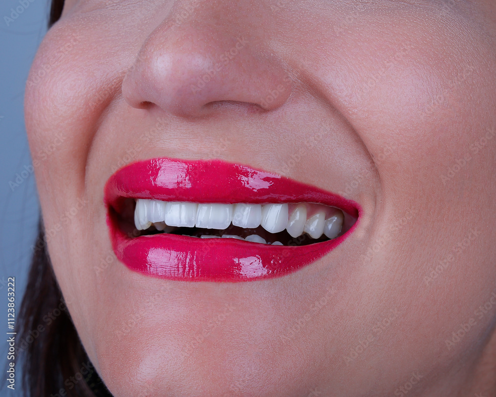 Naklejka premium close up of lips with red lipstick