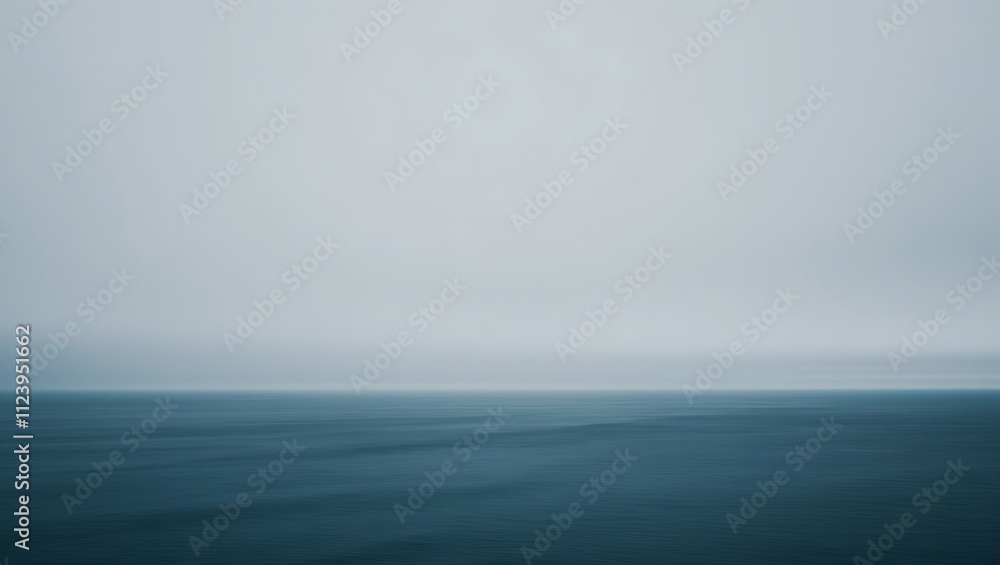 Fototapeta premium Serene Ocean Under a Cloudy Sky