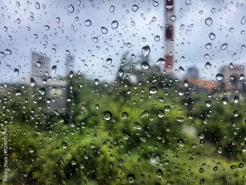 Blur background Raindrops on the window. green tone