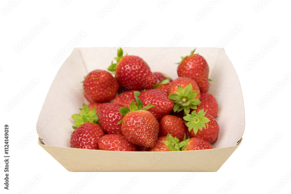Ripe strawberries from the store, in an open cardboard tray. View from above. The box is highlighted on a white background. Ripe strawberries from the store, in an open cardboard tray. View from above. The box is highlighted on a white background.