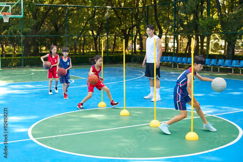Chinese Kids Warming Up During Basketball Training Class