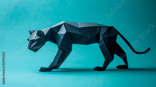 Origami panther in black on vibrant blue background, showcasing intricate design photo