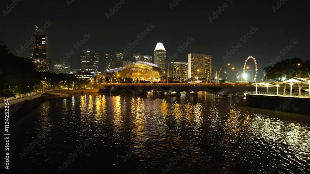 Night scene video shot at Singapore River. Waterfront view of central business district Singapore.