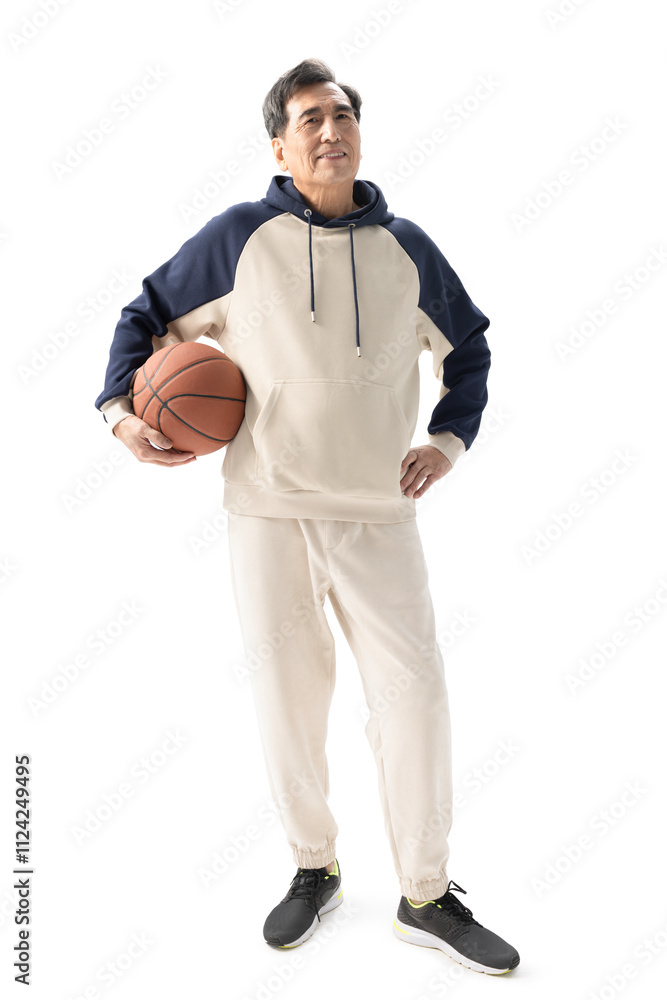 Happy senior Chinese man playing basketball Happy senior Chinese man playing basketball