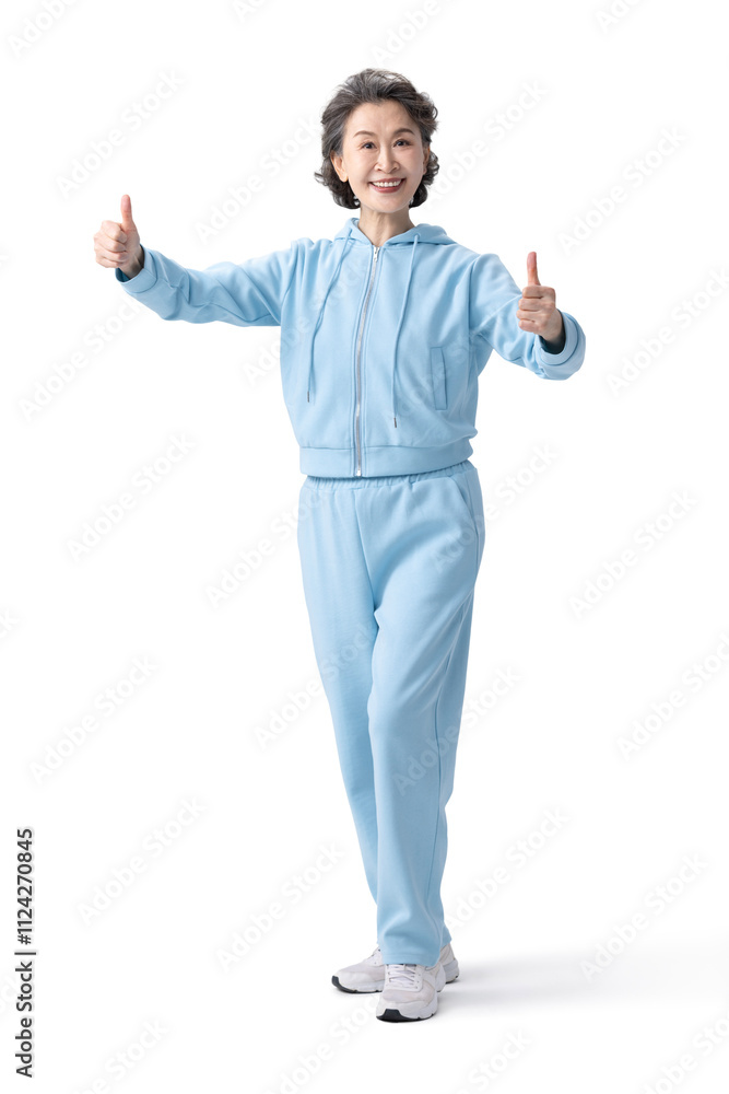 Happy senior Chinese woman doing sports Happy senior Chinese woman doing sports