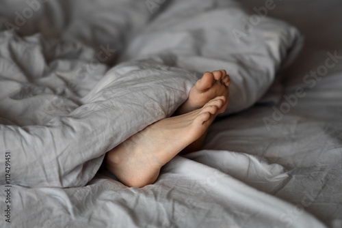 feet under the blanket