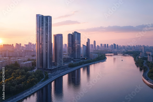 High buildings of Moscow-City at Moskva River at summer sunset, Russia. Moscow-City is business district in Moscow. Panorama of modern office buildings at summer sumset, Moscow downtown in summer.