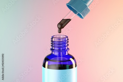 Dark liquid being dispensed from a dropper into a blue glass bottle. photo