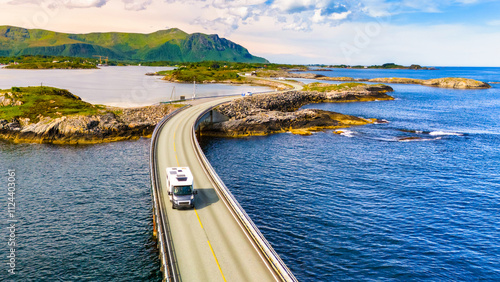 Φωτογραφία An RV or motorhome drives along the Atlantic Road Bridge in Norway, a scenic bridge that connects several islands