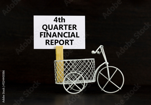 4th quarter financial report symbol. Concept words 4th quarter financial report on beautiful white paper. Beautiful black background. Business 4th quarter financial report concept. Copy space. photo