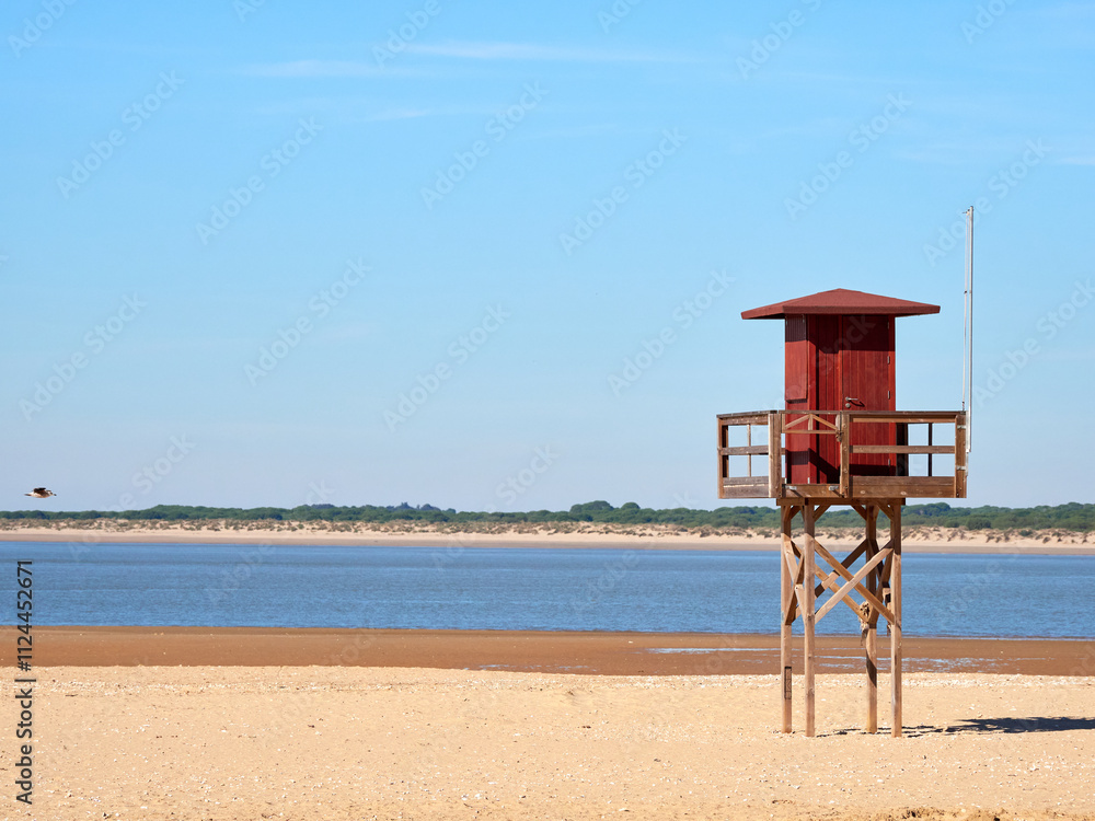 Sanlúcar de Barrameda beach. Opposite is the Doñana National Park. Sunset and fishing boats. Sanlúcar de Barrameda beach. Opposite is the Doñana National Park. Sunset and fishing boats.