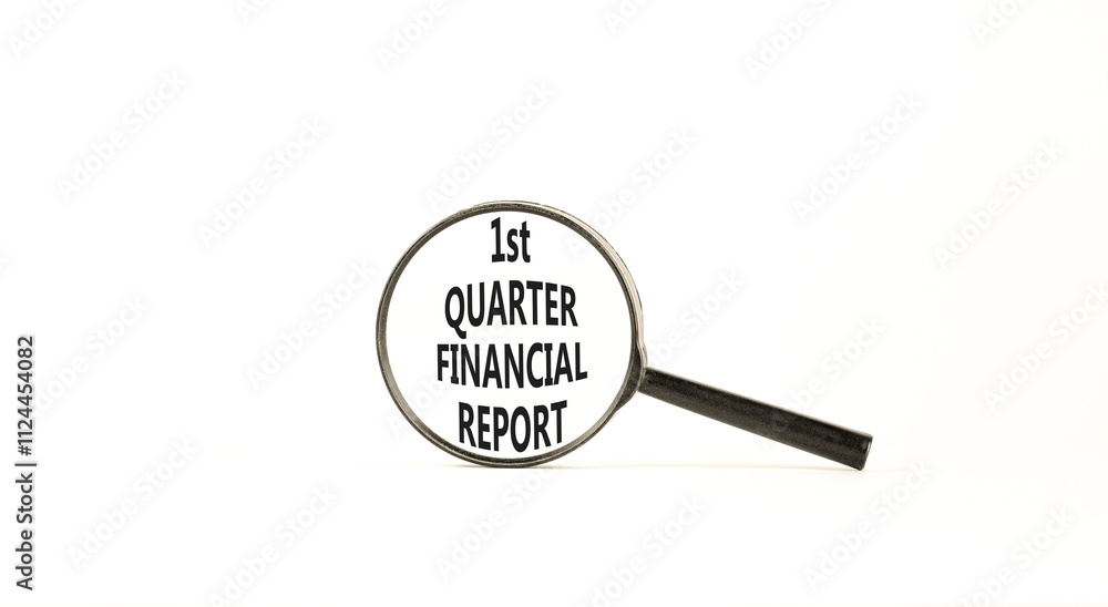 1st quarter financial report symbol. Concept words 1st quarter financial report on beautiful magnifying glass. Beautiful white background. Business 1st quarter financial report concept. Copy space. 1st quarter financial report symbol. Concept words 1st quarter financial report on beautiful magnifying glass. Beautiful white background. Business 1st quarter financial report concept. Copy space.