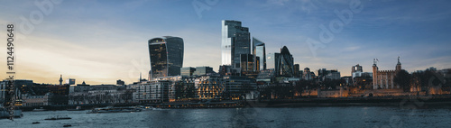 Photography London skyline showing modern buildings at dusk with tower of london