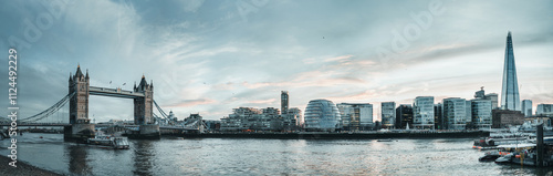 Canvas Print Tower bridge and the shard rising above london skyline at sunset