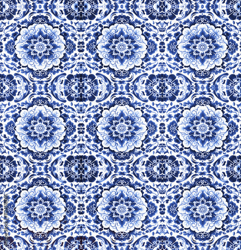 Seamless floral pattern in traditional blue and white colors, inspired by vintage porcelain or Delftware designs.  Perfect for use in textiles, wallpapers, ceramic prints