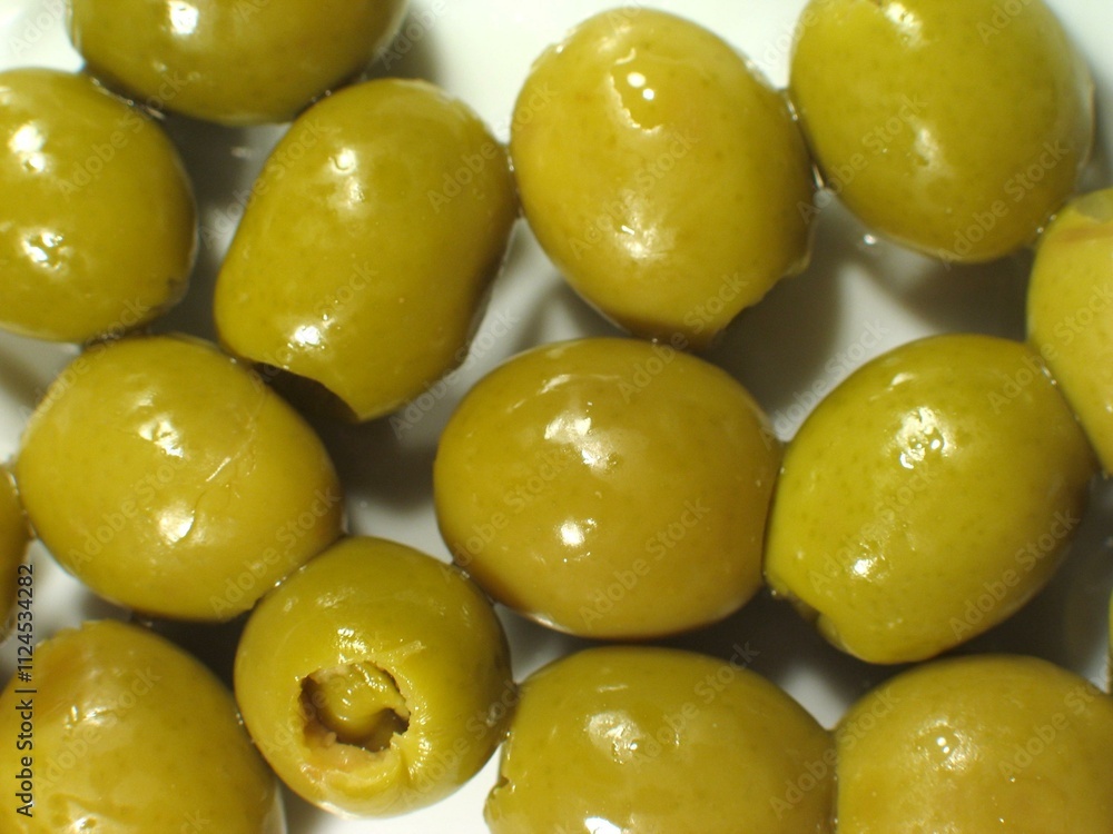 Green olives close view background Green olives close view background