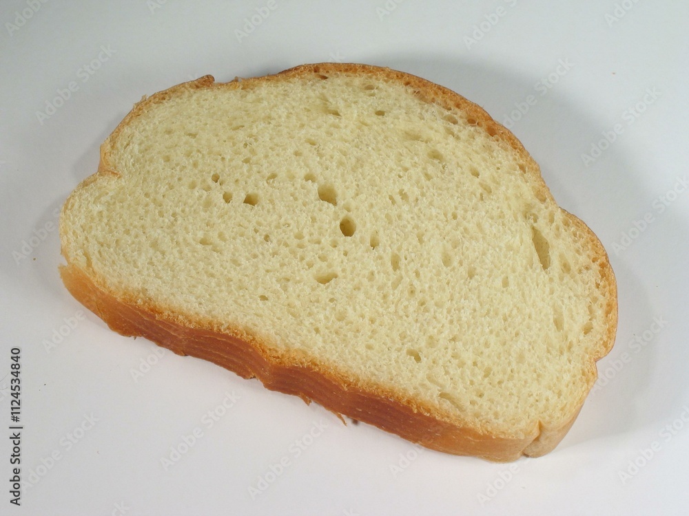 Piece of bread on the table close view background