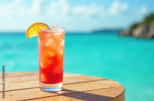 cocktail on a wooden table against the backdrop of the crystal clear sea