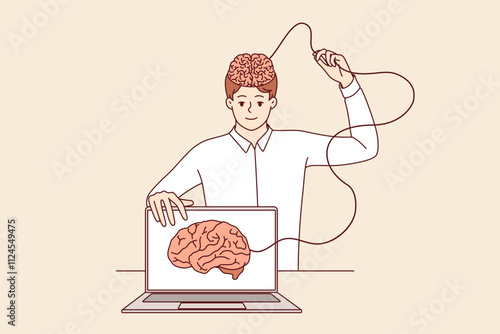 Man develops artificial intelligence and transfers own brain to internet, standing near laptop. Process of learning ai technologies to create innovative software with artificial intelligence