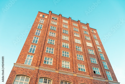 Red brick neo gothic business building by the harbor in Rostock, Germany. photo