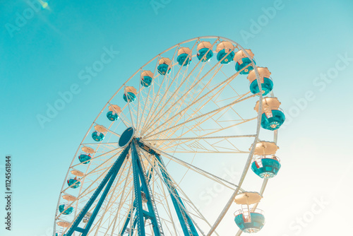 Ferris wheel in the old harbor of Rostock, Germany. photo