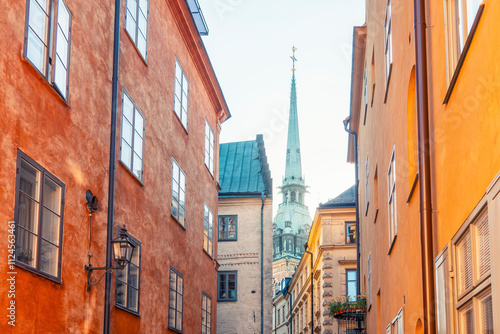 Historic buildings and Saint Gertrude church spire in Gamla Stan, Stockholm. photo