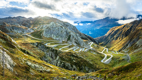 Scenic view of the winding Tremola road leading to Gotthardpass in the Swiss Alps, Kanton Tessin, Valley Leventina. photo