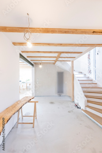 Entrance area and staircase of a home under construction photo