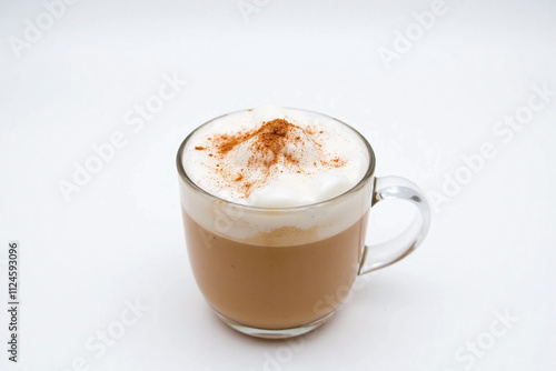 Cup of latte coffee glass cup creamy foam cinnamon cocoa powder