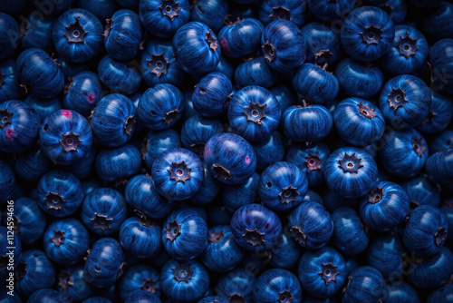 Dense pile fresh blueberries plump round colors textures firm ridges