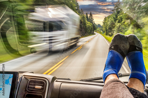 Passenger's perspective through windshield on Norway's E39 highway photo