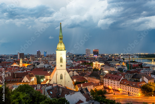 Cityscape of Bratislava's Old Town with St Martins Cathedral at night photo