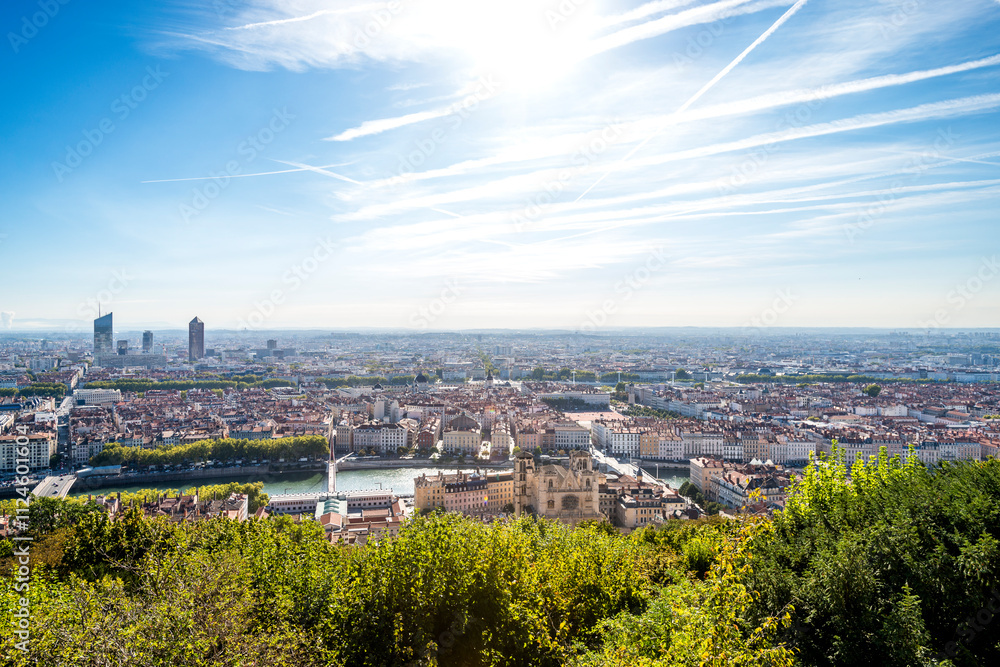 A panoramic view of Lyon, France from the Saint-Jean Cathedral showing the Sa�ne River and cityscape under a clear sky A panoramic view of Lyon, France from the Saint-Jean Cathedral showing the Sa�ne River and cityscape under a clear sky