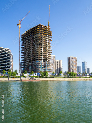 The waterfront in Belgrade, Serbia, with new luxury residential complexes under construction along the Sava river. photo