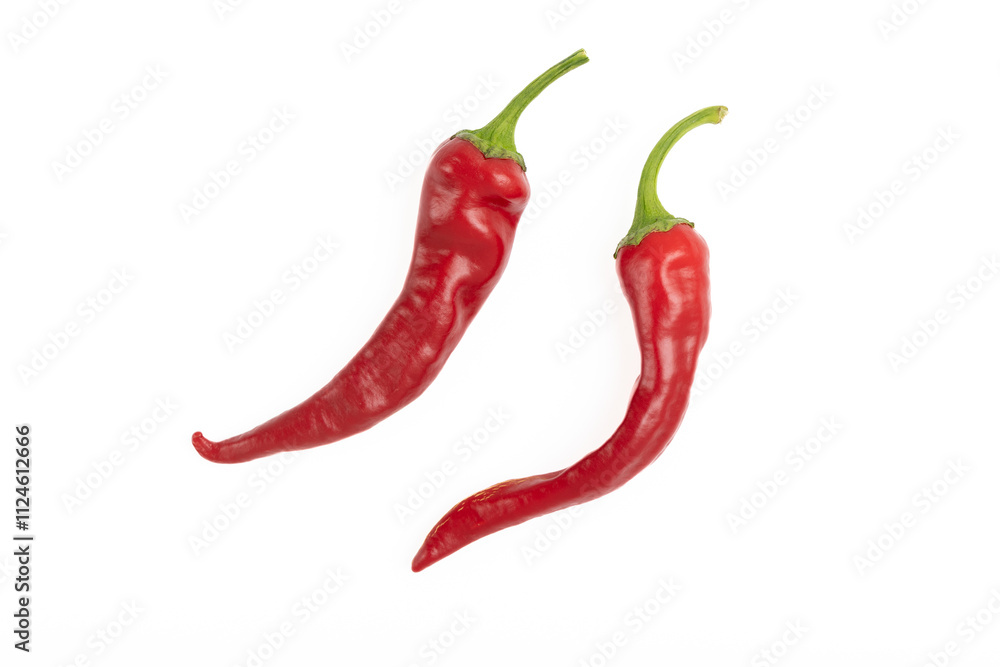 Two red hot chili peppers on a white background Two red hot chili peppers on a white background