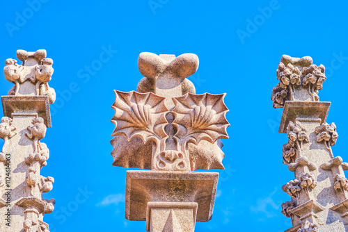 The stone sculptures on the walls and spires of Milan Cathedral, Italy photo