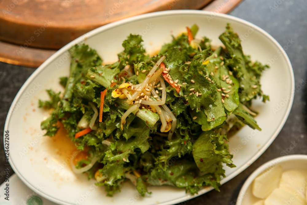 lettuce salad seasoned with soy sauce. Korea food lettuce salad seasoned with soy sauce. Korea food