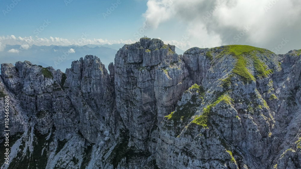 Obraz premium rocky alpine peaks captured by a drone in flight