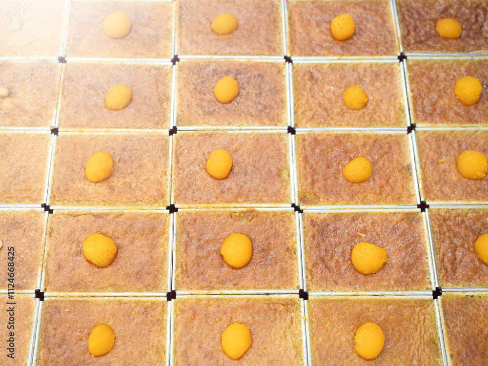 Khanom Mo Kaeng, traditional Thai baked sweet dessert with coconut custard pudding.