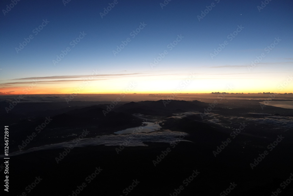 Mt.Fuji, Hiking sunrise from summit viewing Tanzawa mountain range and lake yamanakako Mt.Fuji, Hiking sunrise from summit viewing Tanzawa mountain range and lake yamanakako