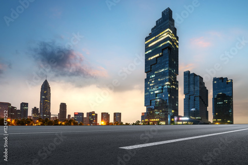 Modern Urban Skyline at Sunset with Dramatic Architecture