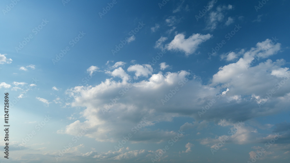 Obraz premium Sky after the storm. Majestic amazing blue sky with stratocumulus clouds. Nature cumulus clouds moving. Timelapse.
