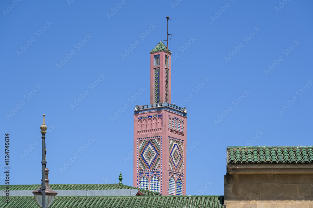 Obraz premium Minaret or tower of the Mosque Sidi Bou Abib in the Place du 9 avril. English : Square of the 9th of April. Tangier, Tanger, Morocco. Perfect blue sky. Minimalist picture.
