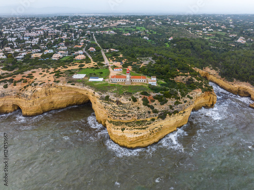 Farol de Alfanzina o Cabo Carvoeiro do Algarve en Lagoa Faro Portugal photo