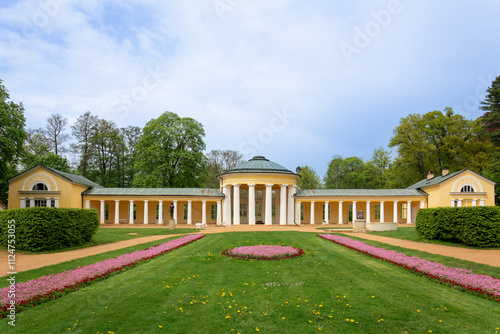 Small colonnade in Marianske Lazne (Marienbad) - spring in spa park. Spa architecture - colonnade of cold mineral water spring Ferdinand - Czech Republic, Europe