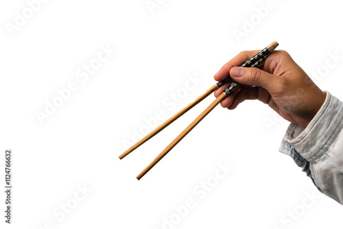 woman hand holding wooden chopsticks isolated on a white background